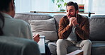 Man, therapist and clipboard with talk for mental health, evaluation or questions on sofa at clinic. Patient, psychology and checklist for anxiety, depression and assessment for consultation on couch