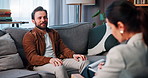 Man, talking and therapist writing for counseling, psychology assessment and medical advice. Patient, psychologist and notes with checklist, diagnosis and information for evaluation on mental health