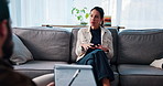 Clipboard, psychologist and woman on sofa in therapy for mental health, stress or burnout. Healthcare, talking and female person with therapist for notes in counseling session with consultation.