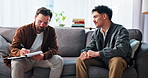 Therapy, writing and therapist with man in office for consulting, counseling session and support. Psychology, mental health and person with patient with notes for diagnosis, listening and help