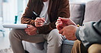 Therapy, writing and hands of people in office for consulting, counseling session and support. Psychology, mental health and therapist with patient with notes for diagnosis, listening and evaluation