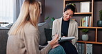 Therapist, woman and writing notes with anxiety, advice and consultation for recovery support and mental health. Counselor, psychologist and conversation for trauma, stress or explain depression