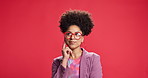 Afro, smile and thinking with black woman on red background for brainstorming, idea or solution. Face, glasses and planning with happy African person isolated in studio for contemplation or vision 
