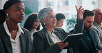Mature business woman, raised hand and audience with question, tablet or feedback at conference. Employee, people and discussion for insight, application or touchscreen at finance convention at event