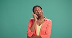 Idea, solution and thinking with black woman on green background for brainstorming or inspiration. Planning, strategy and vision with African person in studio for decision or problem solving