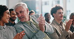 Clapping, success and mature business man in audience for meeting, workshop and deal. Applause, celebration and conference with group of employees at convention for seminar event, crowd and support