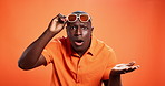 Black man, sunglasses and surprise with face in studio with questions, confused and fashion by background. African person, wow and shock for deal, portrait and style with mock up space in Nigeria