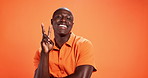 Black man, happy and face with peace sign in studio with laugh, pride and trendy style by background. African person, model and smile with symbol, v emoji and fashion by mock up space in Nigeria