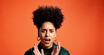 Face, shocked and woman in studio, secret and announcement on orange background. Person, portrait and model with bad news, omg and emotional with discount deal wtf anxiety, and surprise with emoji