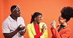 Skincare, products and group with promotion in studio for skin hydration, treatment and dermatology. Happy, people and beauty campaign with cosmetics for anti aging collaboration on orange background