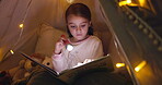 Night, book and flashlight with child in bedroom for bedtime story, reading and relax. Learning, storytelling and fairytale with girl in blanket fort in family home for studying, fantasy and torch