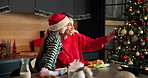 Happy mom, child and christmas with selfie in kitchen for baking memory or picture together at home. Mother, kid or daughter with smile for festive celebration, capture moment or cookies at house