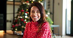 Christmas, face and smile with woman in home for festive celebration, tradition and season. Happiness, December holiday and merry xmas with person in living room of house for vacation and laughing