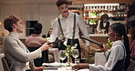 Date, waiter and menu with couple in restaurant for conversation, wine list and fine dining. Honeymoon, talking and partner with man and woman at romantic dinner for trust, hospitality and love