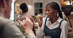 Couple, smile and drinking wine at restaurant on date, talking or romantic flirt. Dinner, interracial man and woman with alcohol glass for relationship, anniversary and commitment for love together