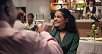 Happy couple, cheers and drinking red wine at restaurant on date, romantic dinner or smile. Toast, man and woman with alcohol glass to celebrate relationship, anniversary and commitment for love