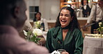 Restaurant, couple and conversation with laughing on date, bonding together and wine for dinner. Romantic dining, partner and woman with happiness for talking, celebrate anniversary and alcohol drink