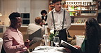 Couple, dating and waiter in restaurant with menu for order, romance or anniversary celebration. Hospitality, conversation and fine dining with man, woman and romantic dinner for valentines day