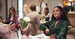 Wine, dating and couple talking in restaurant together for love, romance or anniversary celebration. Smile, conversation and fine dining with man, woman and romantic dinner for valentines day