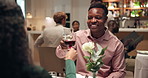 Couple, dating and toast in restaurant with wine for cheers, romance or anniversary celebration. Hospitality, conversation and fine dining with man, woman and romantic dinner for valentines day