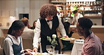 Food, couple and waiter with order in restaurant for service, romantic date or fine dining. Honeymoon, anniversary or server with man, plate or woman at celebration for meal, hospitality and love