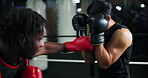Fight, sports and training with people in boxing gym for fitness, self defense or sparring. Boxer, challenge and combat with men punching in ring for competition, exercise or performance as athlete