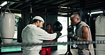 Practice, boxer and man with coach, gym or fight with gloves for self defense, wellness or training. Boxing, fitness and athlete with personal trainer for sport, people or preparation for competition