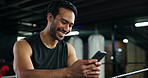 Happy, athlete and man with phone in boxing ring for texting, social media and fight schedule. Male person, laugh and mobile for chatting, streaming battle and funny email for progress results at gym