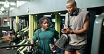Black men, friends and talk with phone at gym for discussion, fitness app and workout video. People, conversation and mobile for training progress, exercise schedule and chat notification at facility