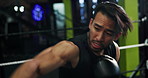 Combat, sports and training with people in boxing gym for fitness, self defense or sparring. Boxer, challenge and fight with men punching in ring for competition, exercise or performance as athlete