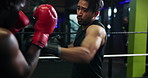 Combat, fight and training with people in boxing gym for fitness, self defense or sparring. Boxer, challenge and sports with men punching in ring for competition, exercise or performance as athlete