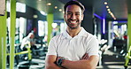 Happy, asian man and face with gym instructor in confidence for health and wellness service. Portrait, male person and manager with smile or arms crossed for exercise or workout at fitness facility