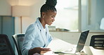 Office, laptop and woman with paperwork, reading or accountant with financial report, web or typing. Happy, employee and black person with documents for investment, corporate and smile for project