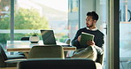 Business, man and tablet with laptop in office for research, financial report and comparison. Accountant, tech and online for reading email, review revenue and schedule update for investment proposal