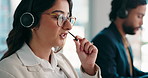 Call center, woman and customer support in office with crm, communication and online consultant. Contact us, headset and technical service help with agent, coworking and hotline for operator advice