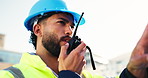 Talking, engineer and man with radio, planning and communication for project management and outdoor. Construction worker, employee and person with tech for architecture, conversation and progress