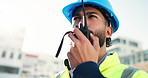 Talking, engineer and man with radio, communication and planning for project management and outdoor. Construction worker, employee and person with tech for architecture, conversation and progress