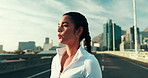 City, runner and woman on break for fitness, health and thinking of wellness outdoor. Town, relax and tired athlete resting after sports workout, exercise and breathing with reflection on street