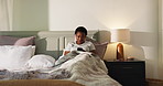 Relax, phone and black woman in bedroom in home for social media, online post and internet in bed. Apartment, comfortable and person with blanket on smartphone for reading website, news and message