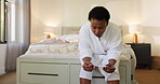 Black woman, waiting and worry with pregnancy test on bed with fertility results of ivf treatment. Thinking, female person and medical stick for pregnant news, regret mistake and unexpected at house