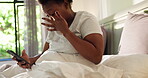 Tired, wake up and phone with black woman in bedroom for notification, social media and scroll. Morning news update, communication and fatigue with person and mobile in home for text message and app