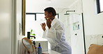 Home, brush and black woman in bathroom, makeup and smile with cosmetics, morning and start day. African person, apartment and tools with foundation, grooming and beauty product with wellness