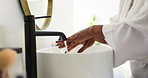 Soap, water and woman washing hands in bathroom for hygiene, health or wellness in home. Sanitary, sink and female person with skin routine for disinfection with germ, bacteria or dirt removal.