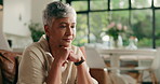 Thinking, sad and mature woman in home with depression, unsure and reflection in living room. Mental health, retirement and senior person with thoughtful, memory and wondering for wellness in house