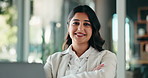 Office, crossed arms and face of business woman for finance report, research and financial consultant. Professional, corporate and portrait of person on laptop for planning, project and budget review