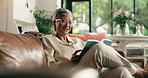 Relax, reading and mature woman on sofa with book in home for hobby, fiction and story. Retirement, living room and person with novel, literature and fantasy for wellness, peace and rest in house