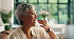 Senior woman, pills and drink water at house for supplements, prescription and chronic illness. Elderly person, smile or thinking with medicine tablet, daily routine and wellness benefits of recovery