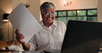 Excited, employee and woman with paperwork, home and happiness for financial success, web or laptop. Night, business analyst and mature person with glasses for review, report and smile in house