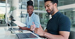 Coworking, laptop and thumbs up with business man at desk in office for report or research. Computer, smile and typing with employee people in workplace together for productivity as colleagues