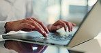 Hands, typing and businessperson with laptop in office with research for online finance proposal. Keyboard, technology and financial manager with computer for email feedback on investment report.